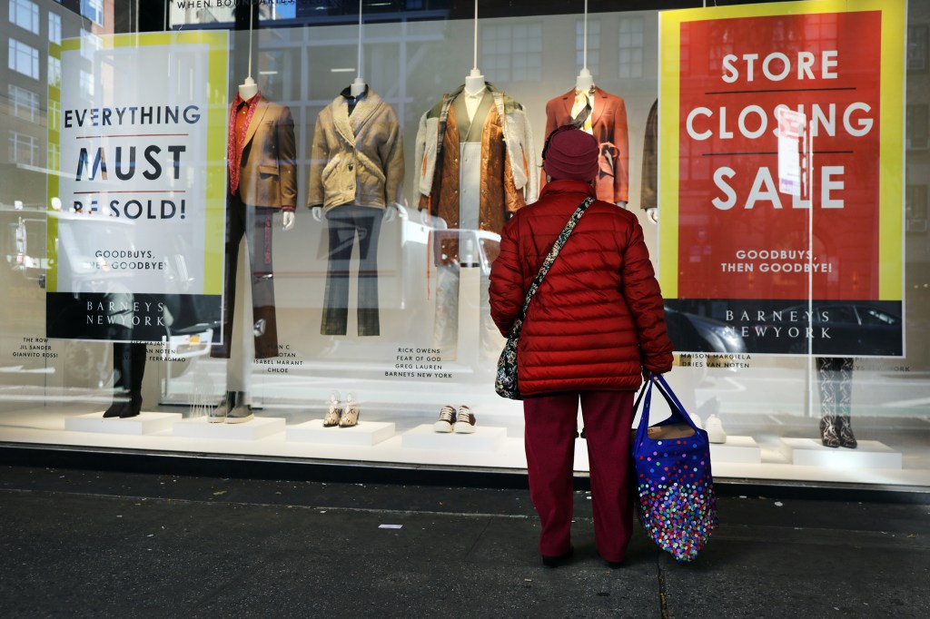 NEW YORK, NEW YORK - NOVEMBER 06: Window signs announce the first few days of a clearance sale at iconic New York department store Barney's on November 06, 2019 in New York City. Barney's, which had been a destination for wealthy and fashion-conscious shoppers for years, was recently sold in two parts in a $271 million deal. As part of the transaction, Barney's intellectual property will be transferred to licensing firm Authentic Brands Group. The closing of Barney's is another development in the crisis facing many retail stores in America as consumers shift to online shopping. (Photo by Spencer Platt/Getty Images)